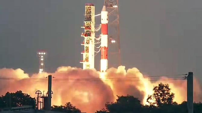 ISRO's PSLV-C61 rocket launches from Satish Dhawan Space Centre with bright exhaust plumes