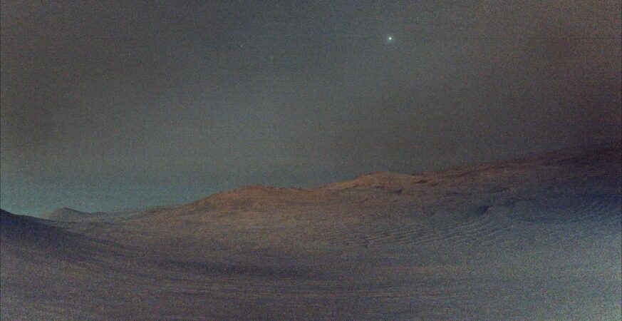 NASA’s Perseverance rover captures a rare pre-dawn view of Mars’ moon Deimos glowing in the dark Martian sky before sunrise