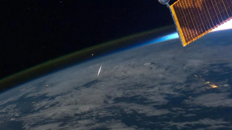 Fireball meteor explosion in Earth's atmosphere producing sonic boom